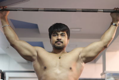 Portrait of muscular man posing