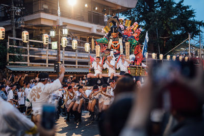 People on street in city