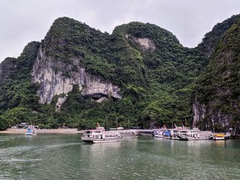 Scenic view of rocks in mountains against sky