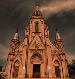 Low angle view of temple building against sky