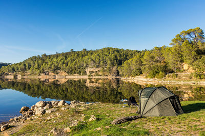 Scenic view of fishing camp tent at lake in provence south of france in autumn daylight