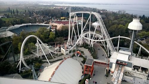 High angle view of ferris wheel in city