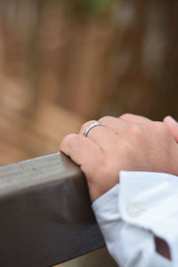 Close-up of hand holding hands