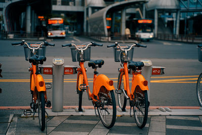 Bicycles parked on road in city