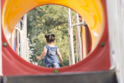 Boy playing in playground