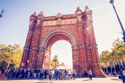 Group of people in front of historical building