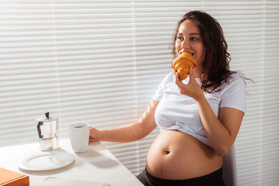 Young woman eating food