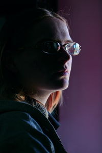 Close-up portrait of woman wearing sunglasses