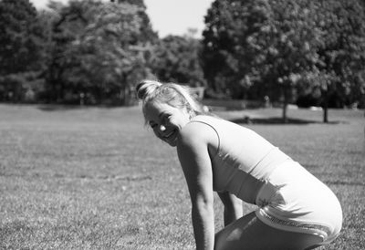 Young woman on field