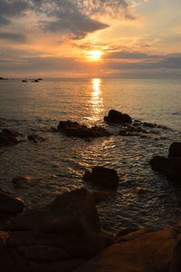 Scenic view of sea against sky during sunset