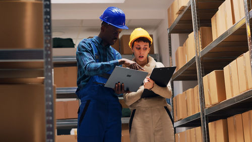 Rear view of man working in office