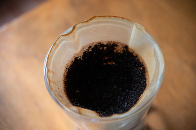 High angle view of coffee cup on table