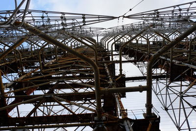 Low angle view of construction site against sky