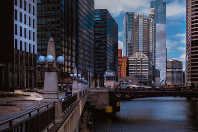 Modern buildings in city against sky