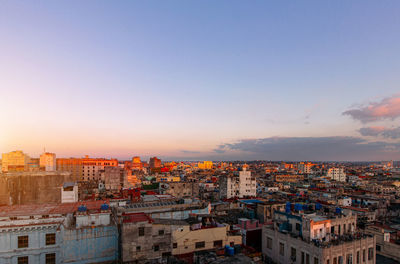 High angle view of townscape against sky during sunset