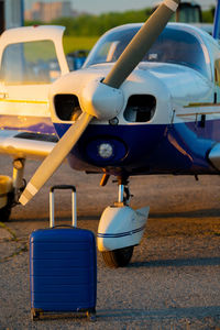 Close-up of airplane on airport runway