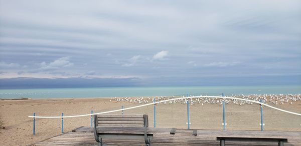 Pier over sea against sky