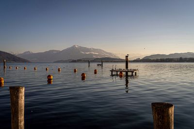 Scenic view of sea against clear sky lake lake of zug