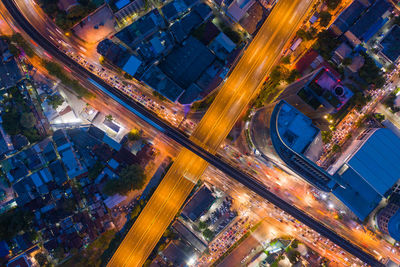 High angle view of illuminated city street at night