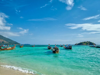 Scenic view of sea against blue sky