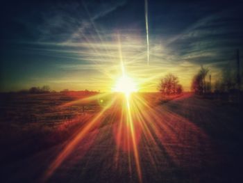 Scenic view of landscape at sunset