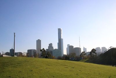 View of cityscape against clear sky