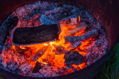 Close-up of fire on wood