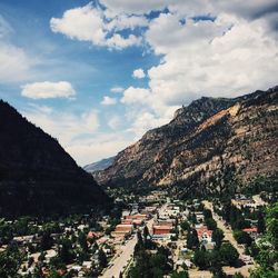 Scenic view of mountains against cloudy sky