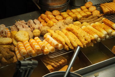 High angle view of meat on barbecue grill