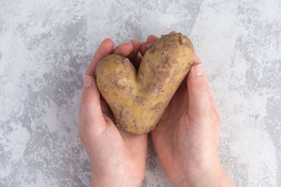 Cropped image of hand holding ice cream