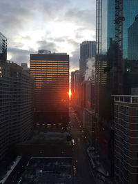 Buildings in city against sky