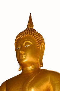 Statue of buddha against white background