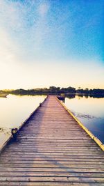 View of jetty leading to sea