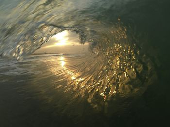 Scenic view of sea at sunset