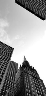 Low angle view of modern buildings against sky