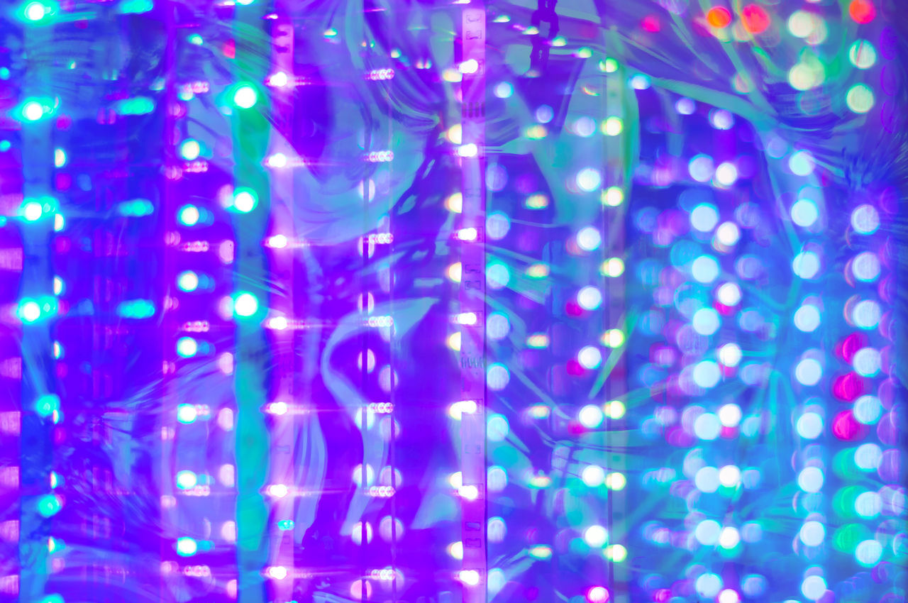 backgrounds, pattern, illuminated, no people, decoration, lighting equipment, celebration, full frame, abstract, blue, multi colored, glowing, circle, light - natural phenomenon, light, christmas lights, purple, vibrant color, shiny, technology, line, event, indoors, christmas decoration, night, christmas