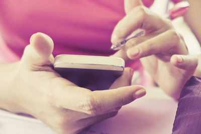 Close-up of hand holding hands