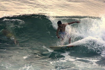 Man surfing in sea