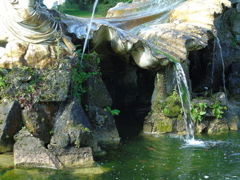 Close-up of waterfall against rock formation