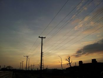 Electricity pylon at sunset