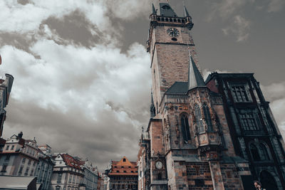 Low angle view of buildings against sky in city