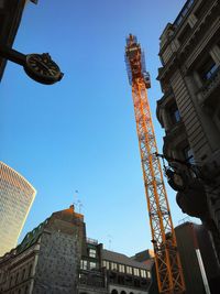 Low angle view of buildings against clear sky