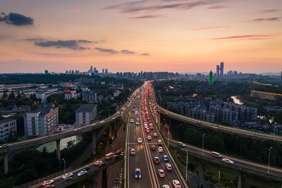 High angle view of cityscape against sky during sunset