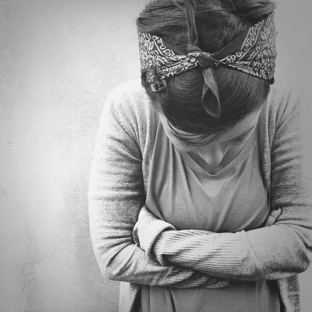 casual clothing, lifestyles, leisure activity, standing, indoors, front view, young adult, waist up, rear view, hat, three quarter length, holding, person, sitting, young women, home interior, wall - building feature