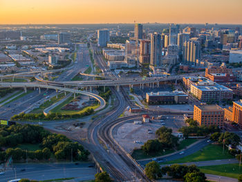 Aerial view of the texas school book depository with highways around.