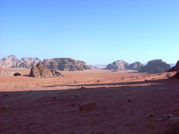 Scenic view of desert against clear sky