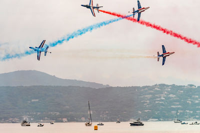 Scenic view of airshow in sky