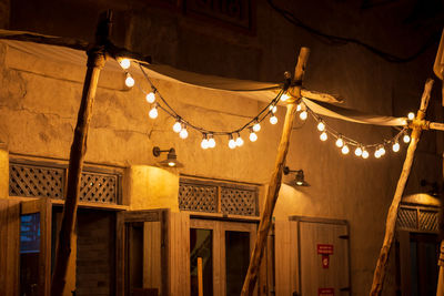 String lights outside an old structure