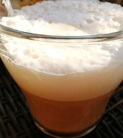 Close-up of beer glass on table