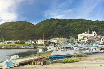 Fishing boats moored on the port of the kanaya village in futtsu city along the uraga channel.